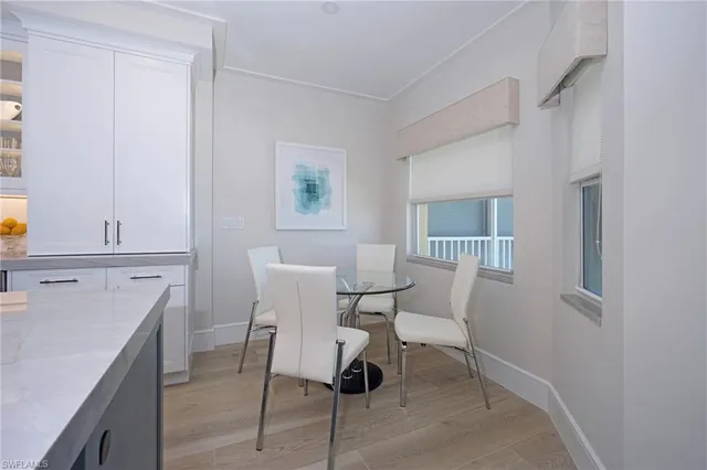 a bed room with a bed and a night stand