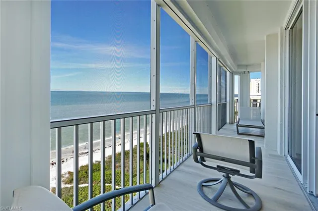 a view of a livingroom with furniture and front door