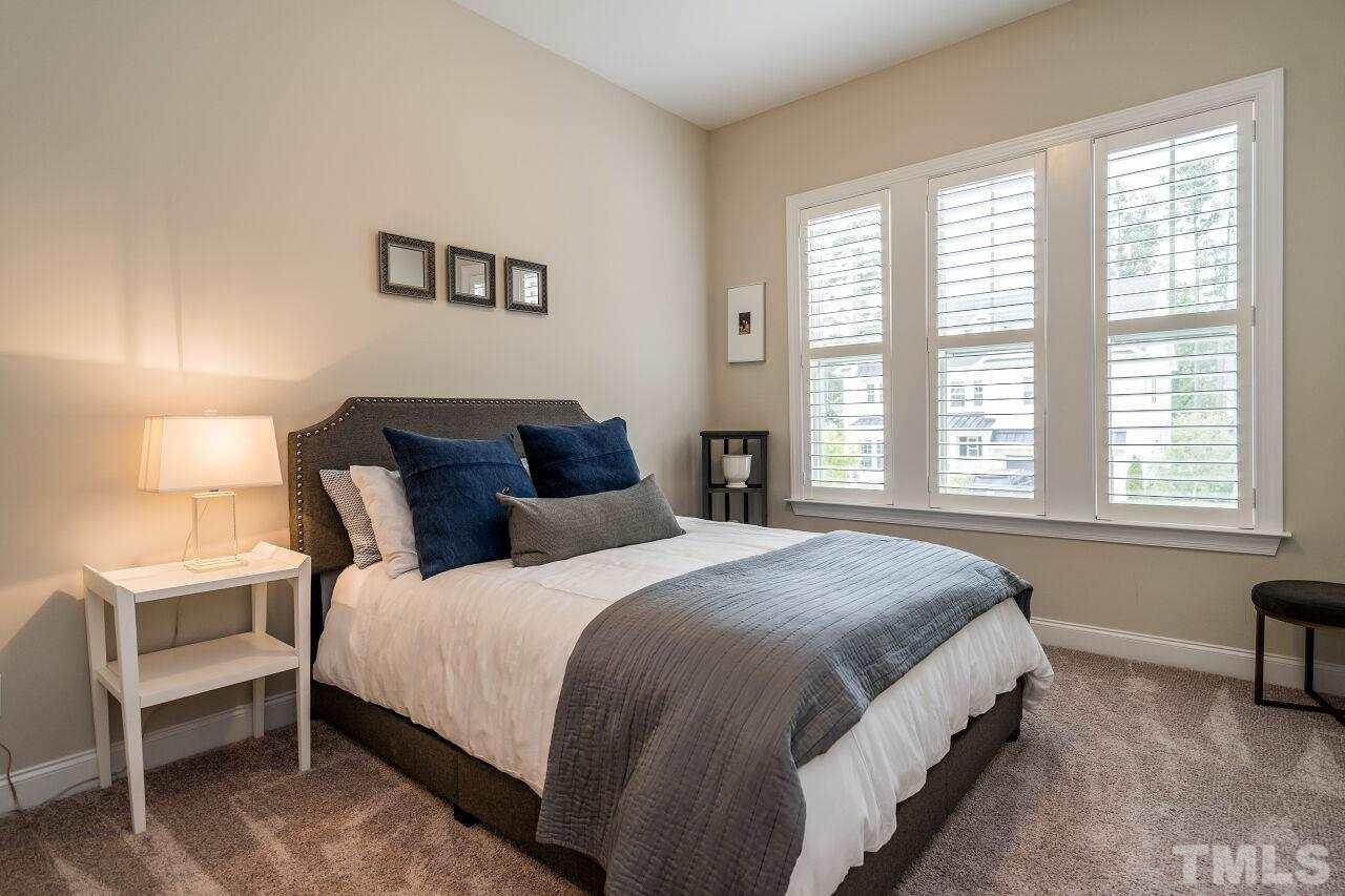 5268 Aleppo Lane Raleigh, NC 27613 - Photo 14 of 30 Main level bedroom with full bath is perfect for guests!