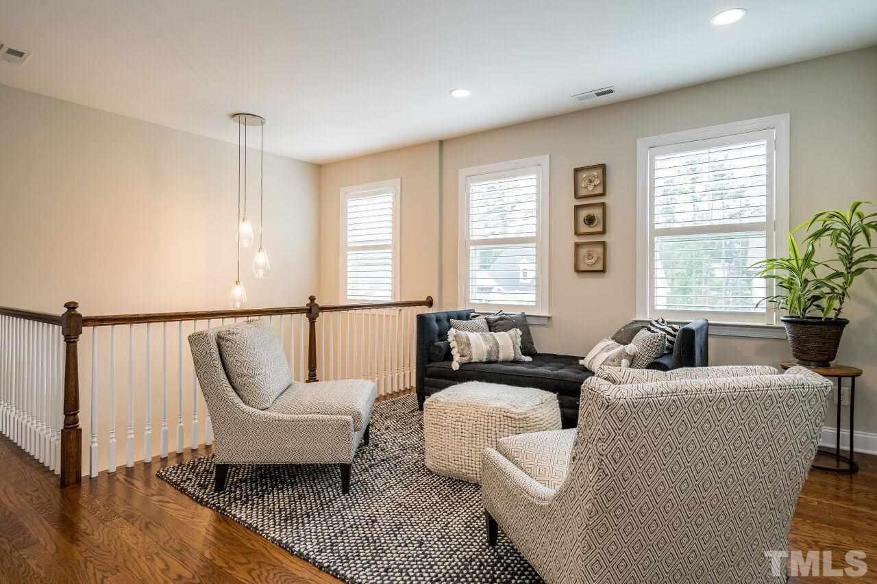 5268 Aleppo Lane Raleigh, NC 27613 - Photo 17 of 30 Second floor loft with hardwoods, ample light and space for a cozy reading area or another home office!
