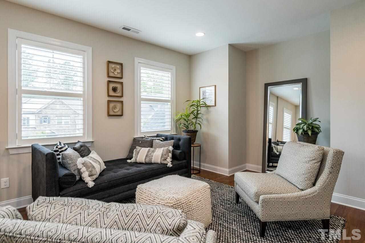 5268 Aleppo Lane Raleigh, NC 27613 - Photo 18 of 30 Second floor loft with hardwoods, ample light and space for a cozy reading area or another home office!