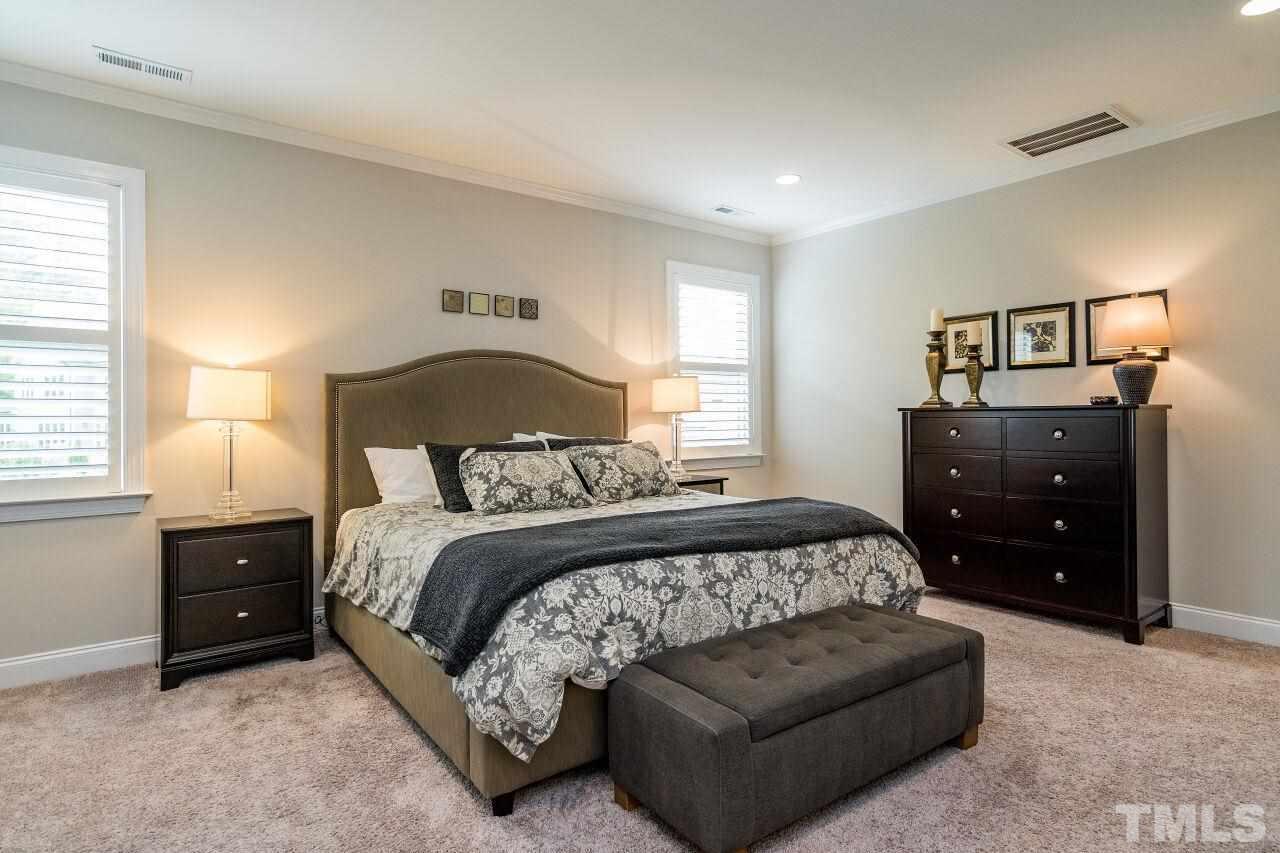 5268 Aleppo Lane Raleigh, NC 27613 - Photo 19 of 30 Unwind after a long day at the office with your owner's suite retreat!