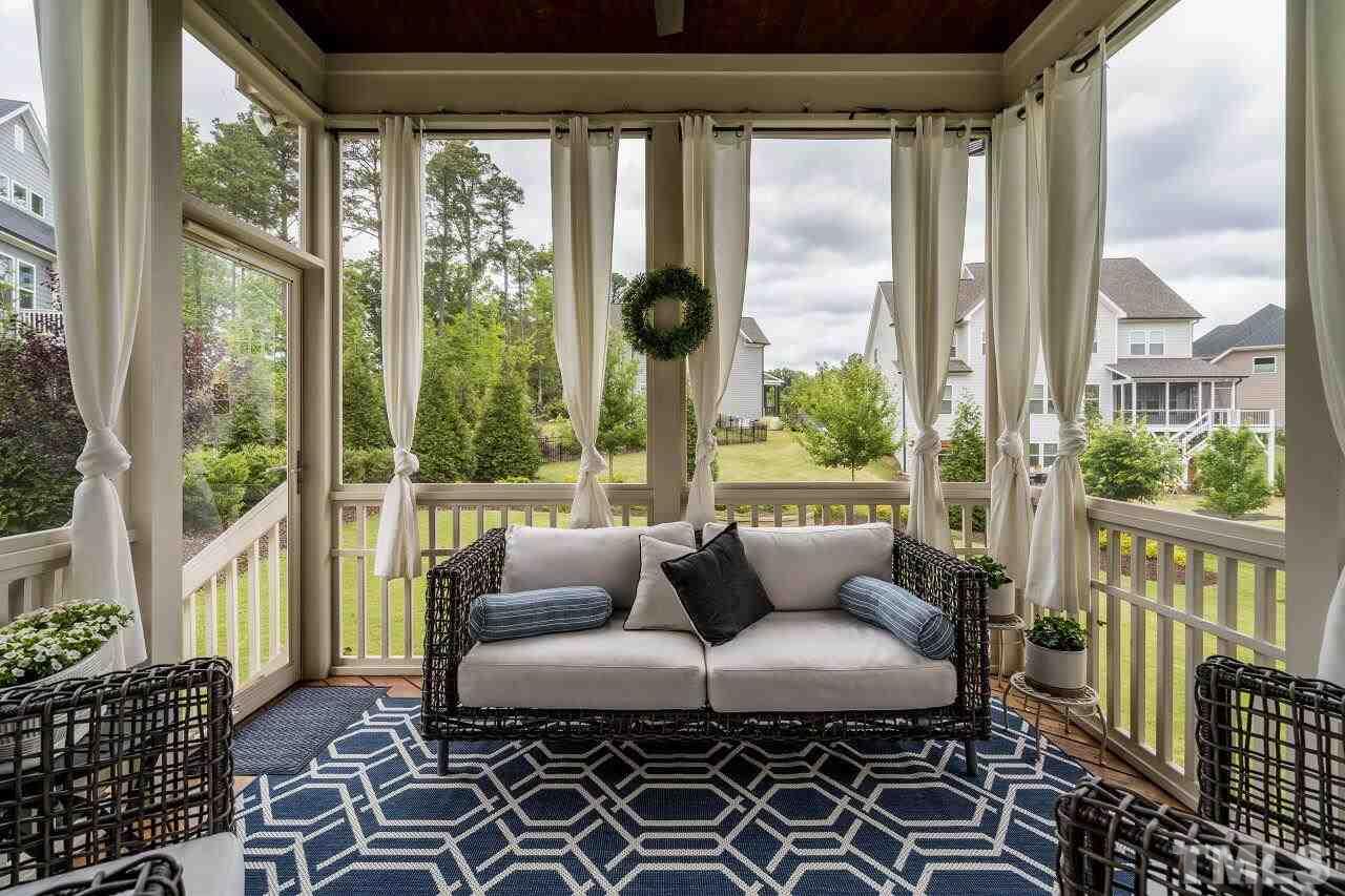 5268 Aleppo Lane Raleigh, NC 27613 - Photo 28 of 30 Elegant screened porch for morning coffee, outdoor office and cookouts with friends!