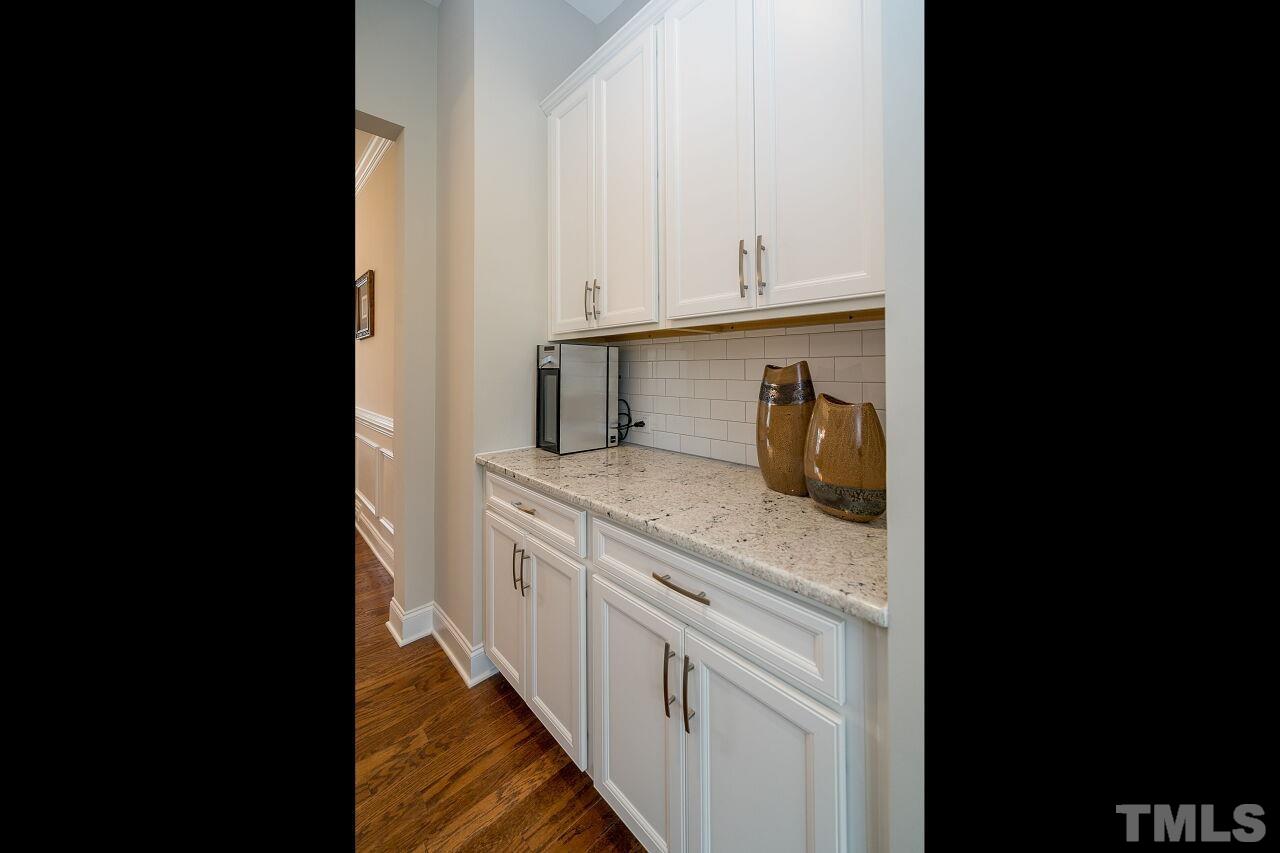 5268 Aleppo Lane Raleigh, NC 27613 - Photo 5 of 30 Perfect go between for kitchen and dining room. Great coffee bar, serving area, and place to display!