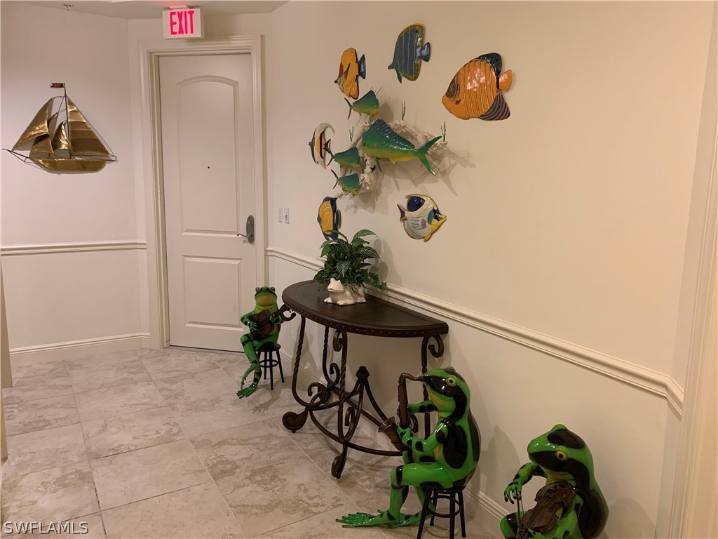 2090 West First Street, Unit 2107 Fort Myers, FL 33901 - Photo 31 of 35 a table with flowers in it