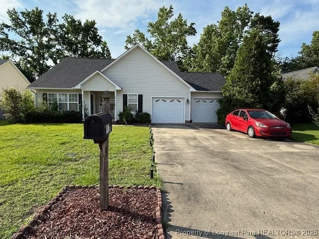 a house view with a garden space