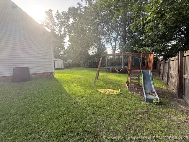 a backyard of a house with large garden and entertaining space