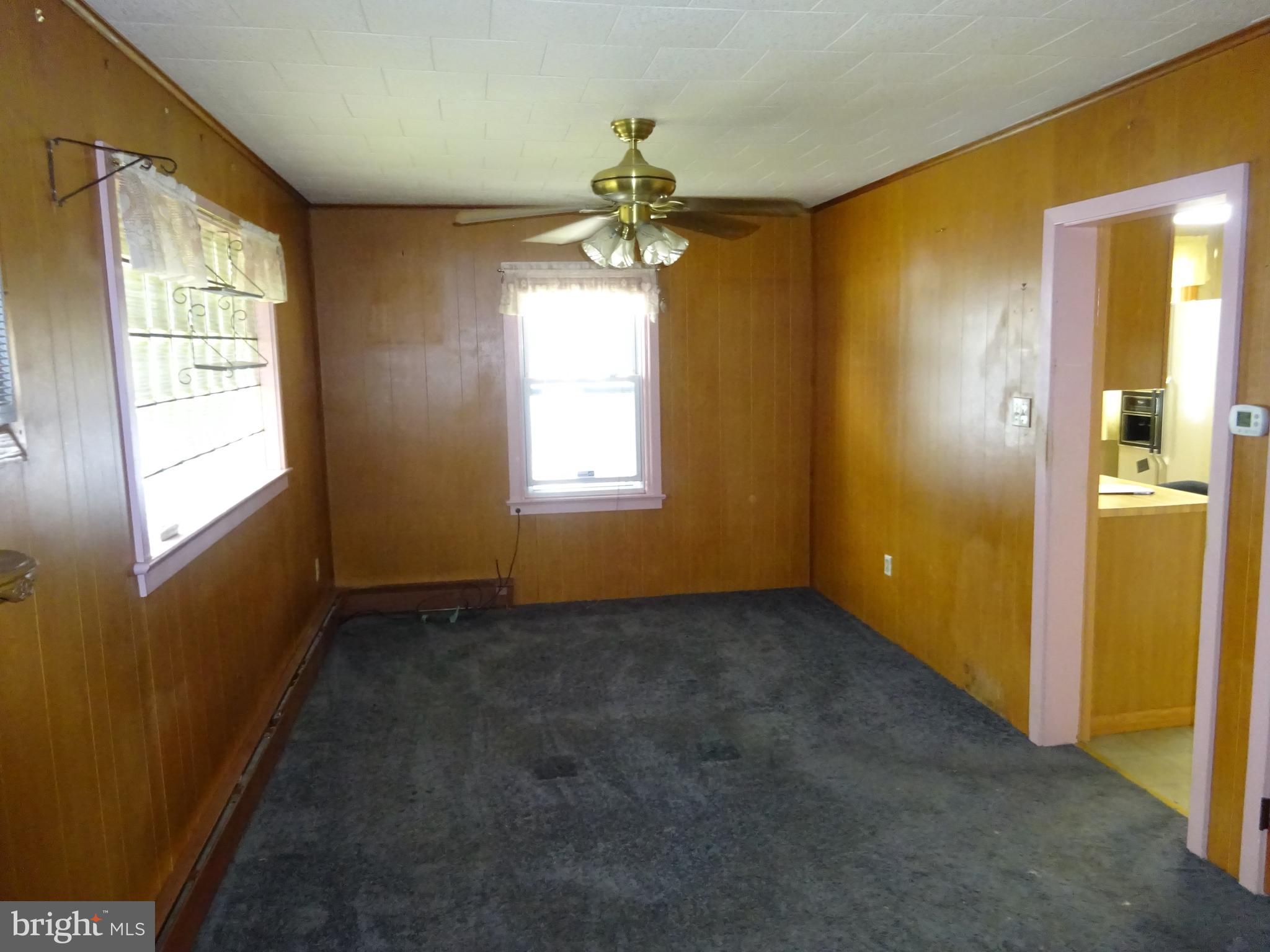 1106 Gregg Avenue Reading, PA 19607 - Photo 8 of 34 Dining Room, wood floors under carpet