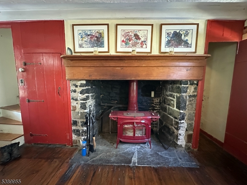 223 Federal Twist Road Stockton, NJ 08559 - Photo 16 of 28 a living room with furniture and a fireplace