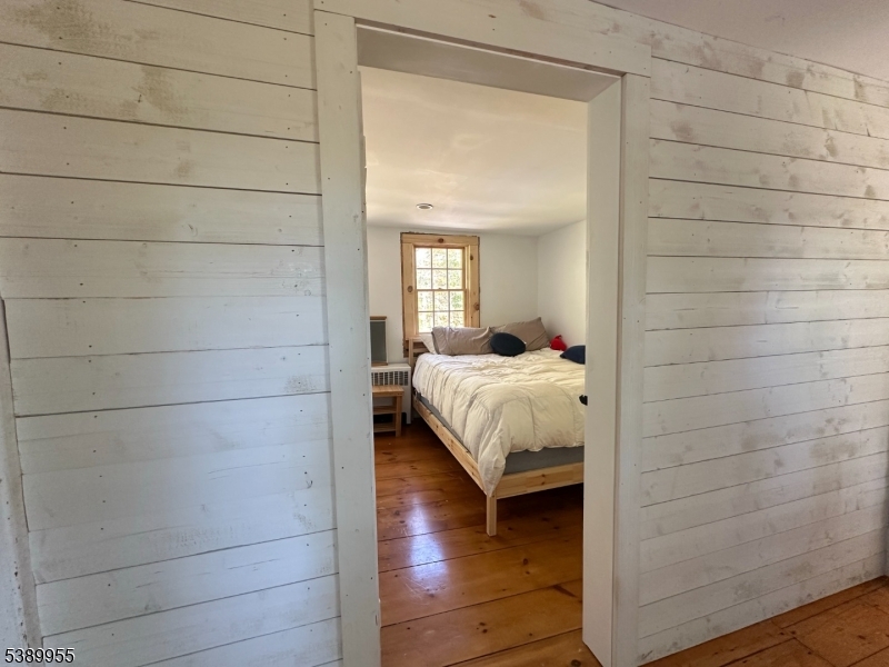 223 Federal Twist Road Stockton, NJ 08559 - Photo 19 of 28 a en suite bathroom with a granite countertop shower and a mirror