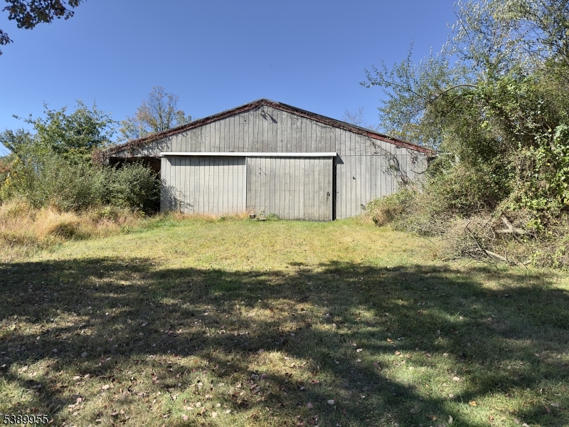 223 Federal Twist Road Stockton, NJ 08559 - Photo 25 of 28 a view of a house with a yard