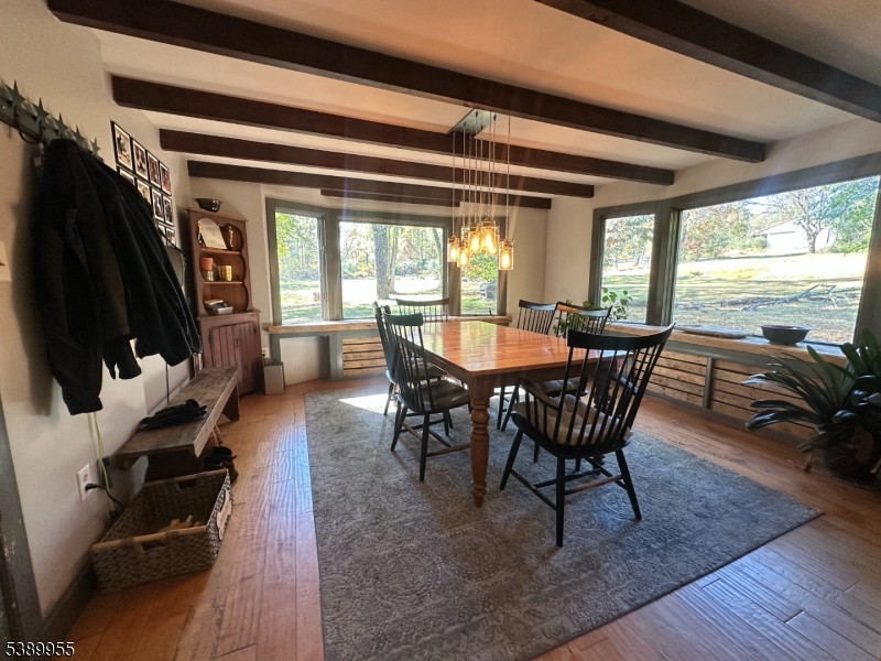 223 Federal Twist Road Stockton, NJ 08559 - Photo 5 of 28 a dining room with furniture and wooden floor