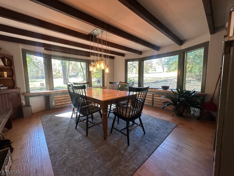 223 Federal Twist Road Stockton, NJ 08559 - Photo 6 of 28 a view of a dining room with furniture window and outside view