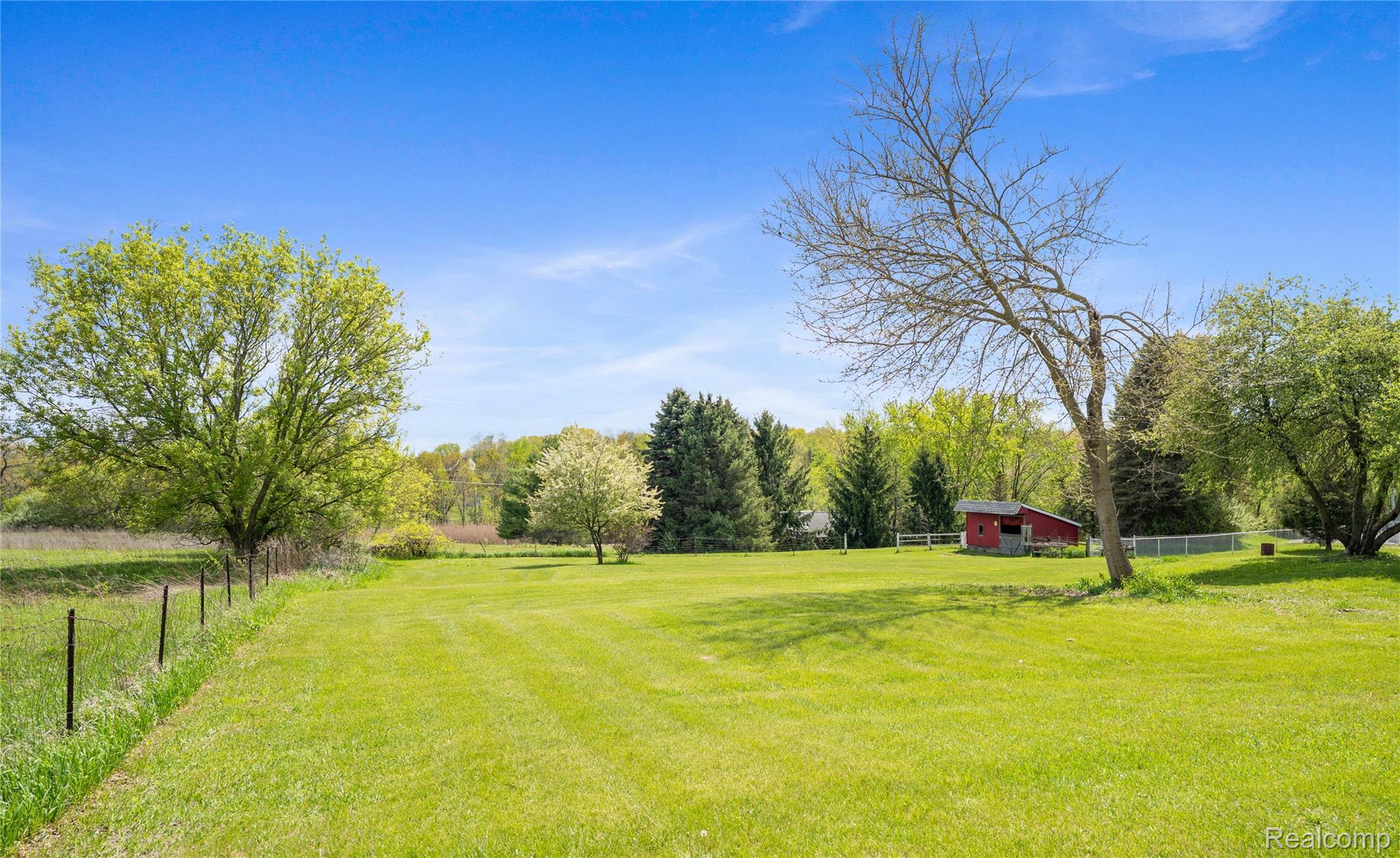 2725 Cooley Lake Road Highland, MI 48356 - Photo 63 of 67 Backyard
