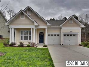 135 Whitley Mills Road Fort Mill, SC 29708 - Photo 1 of 8 a front view of a house with garden