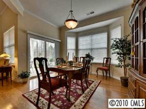 135 Whitley Mills Road Fort Mill, SC 29708 - Photo 5 of 8 a view of a dining room with furniture