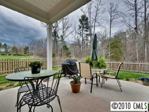 135 Whitley Mills Road Fort Mill, SC 29708 - Photo 8 of 8 a view of a chairs and table in the patio