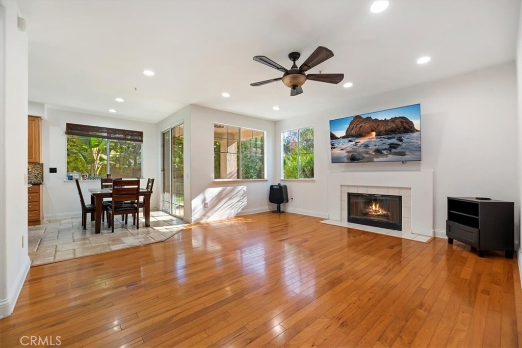 2310 Crown Point Court Oxnard, CA 93036 - Photo 13 of 50 a living room with furniture and a fireplace