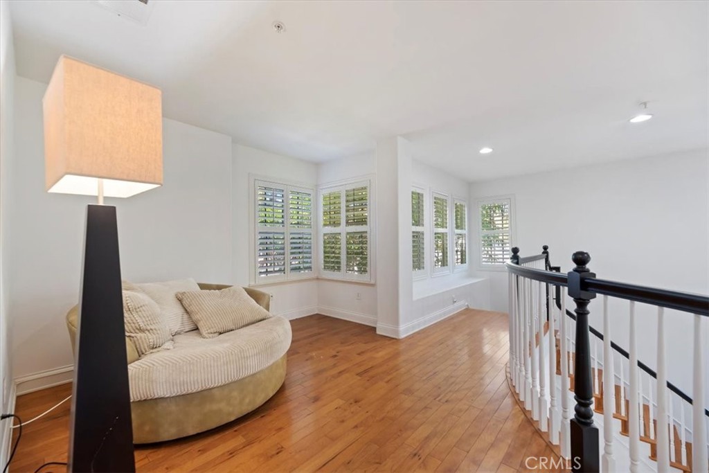 2310 Crown Point Court Oxnard, CA 93036 - Photo 23 of 50 a living room with furniture and a window