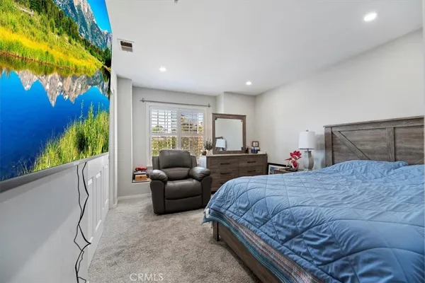 a bathroom with a sink a mirror and a shower curtain