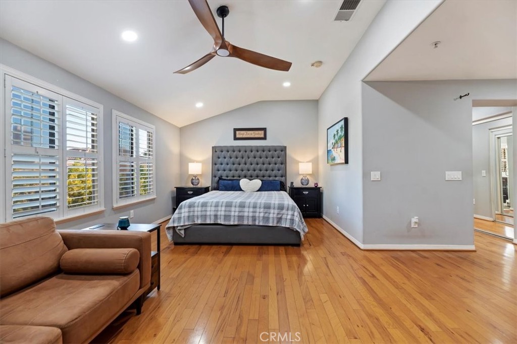 2310 Crown Point Court Oxnard, CA 93036 - Photo 30 of 50 a bedroom with a bed and window