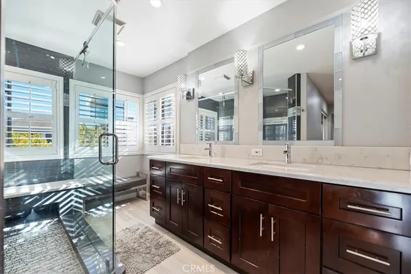 a kitchen with granite countertop a sink and a stove