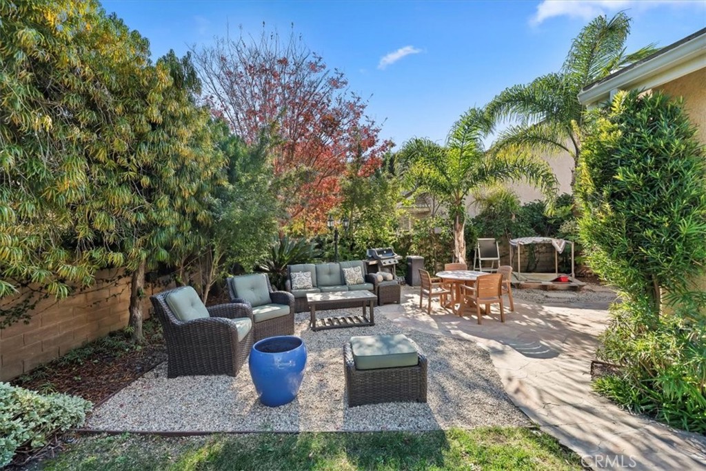 2310 Crown Point Court Oxnard, CA 93036 - Photo 36 of 50 a view of a backyard with sitting area