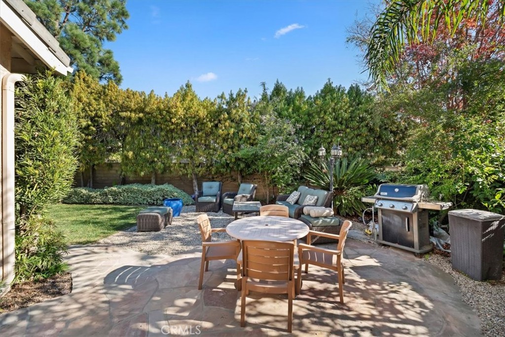 2310 Crown Point Court Oxnard, CA 93036 - Photo 37 of 50 a view of a backyard with sitting area