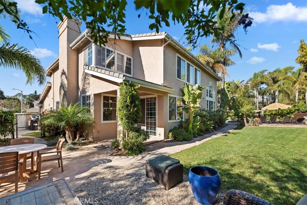 2310 Crown Point Court Oxnard, CA 93036 - Photo 40 of 50 a view of an house with backyard porch and sitting area