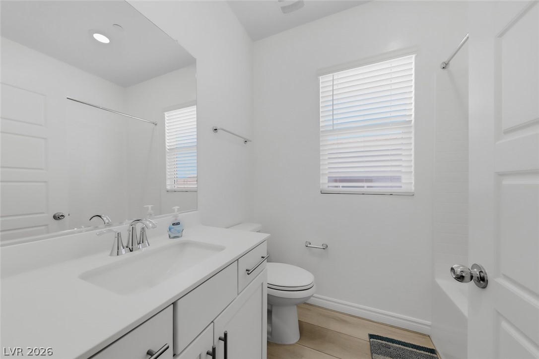 290 Rusty Ridge Lane Henderson, NV 89015 - Photo 20 of 61 Bed 2 bath with white shaker cabinets, quartz counters & tub/shower combo