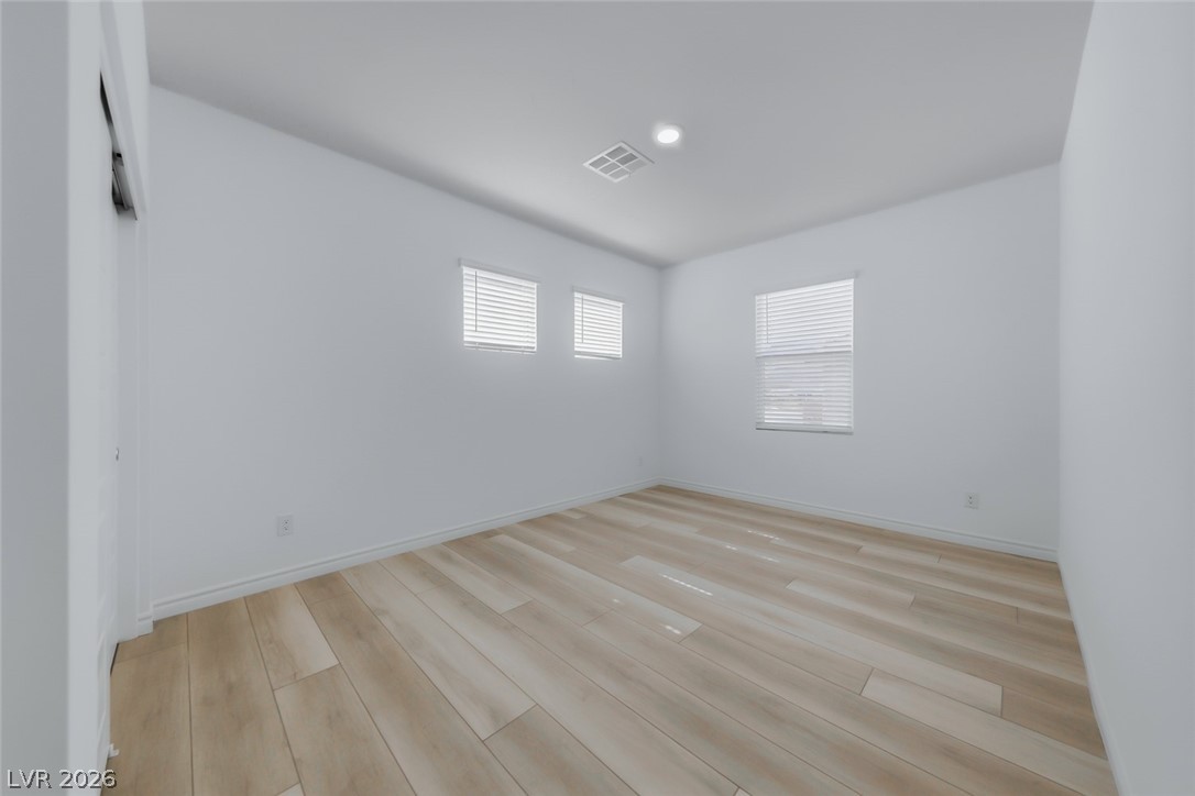 290 Rusty Ridge Lane Henderson, NV 89015 - Photo 22 of 61 Bed 3 with luxury vinyl plank floors & closet