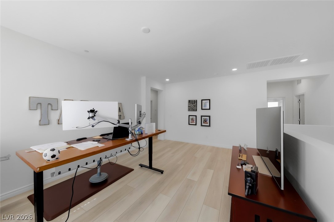 290 Rusty Ridge Lane Henderson, NV 89015 - Photo 28 of 61 Loft w/luxury vinly plank floors, recessed lights & balcony