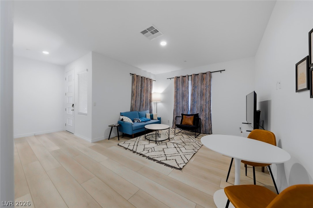 290 Rusty Ridge Lane Henderson, NV 89015 - Photo 34 of 61 First Floor Fully Furnished Next-Gen Suite w/separate entry, Kitchenette, living room, bed & bath, luxury vinly plank floors, fridge, convection microwave & Stackable washer/dryer.