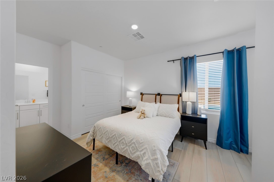 290 Rusty Ridge Lane Henderson, NV 89015 - Photo 36 of 61 First Floor Fully Furnished Next-Gen Suite w/separate entry, Kitchenette, living room, bed & bath, luxury vinly plank floors, fridge, convection microwave & Stackable washer/dryer.