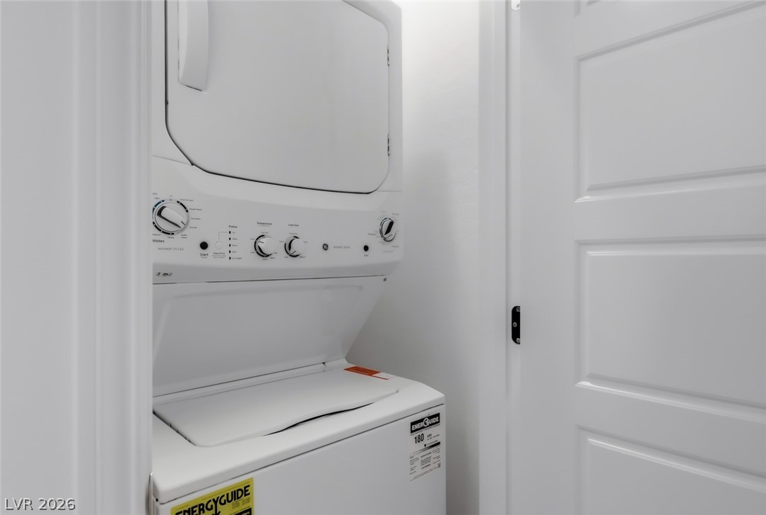 290 Rusty Ridge Lane Henderson, NV 89015 - Photo 39 of 61 First Floor Fully Furnished Next-Gen Suite w/separate entry, Kitchenette, living room, bed & bath, luxury vinly plank floors, fridge, convection microwave & Stackable washer/dryer.