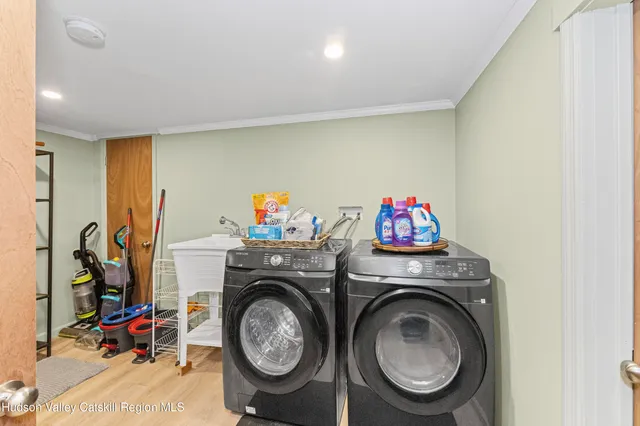 a utility room with dryer and washer