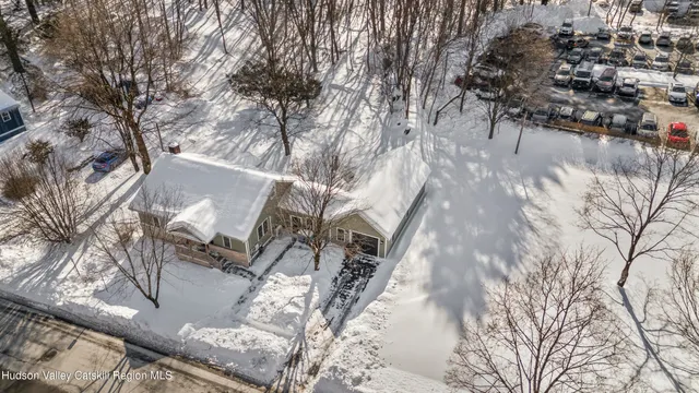 a view of a yard with a tree