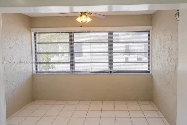 a view of an empty room with window