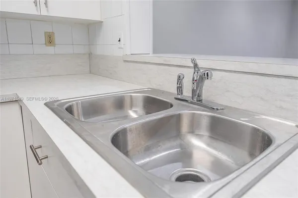 a view of a storage & utility room with washer and dryer
