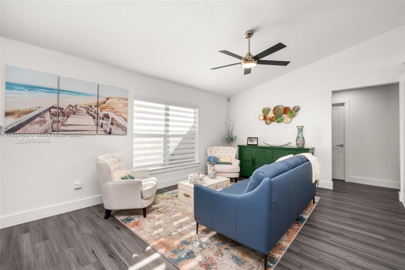 5810 Columbus Boulevard Sebring, FL 33872 - Photo 2 of 49 a living room with furniture and a wooden floor