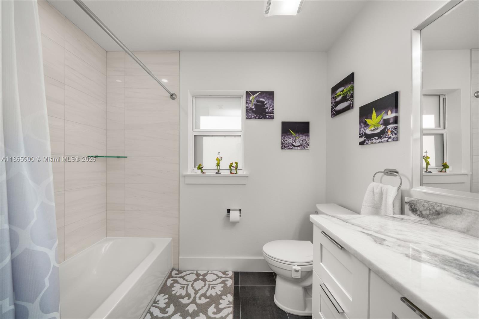 5810 Columbus Boulevard Sebring, FL 33872 - Photo 26 of 49 a bathroom with a sink a toilet and shower