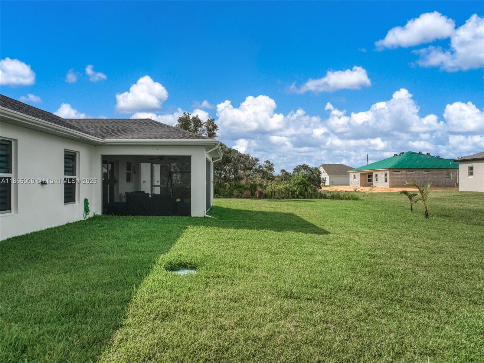 5810 Columbus Boulevard Sebring, FL 33872 - Photo 36 of 49 a view of a house with a yard