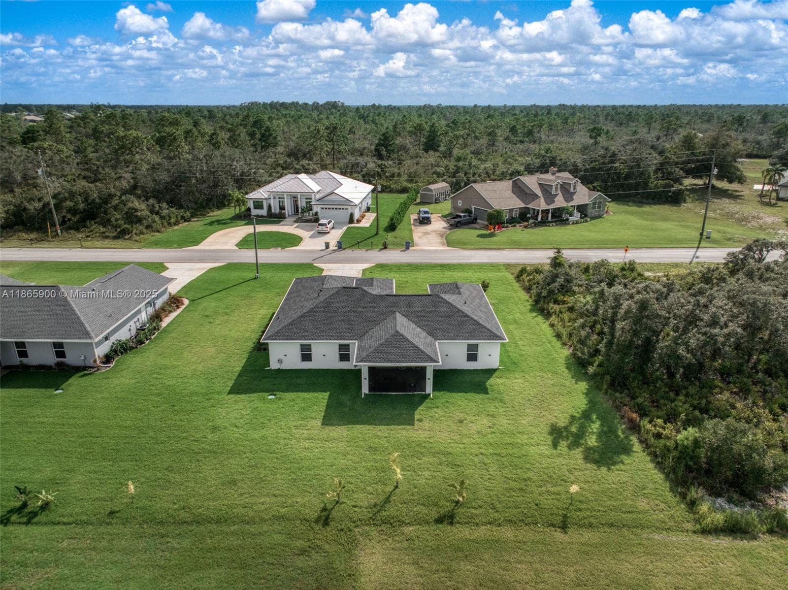5810 Columbus Boulevard Sebring, FL 33872 - Photo 40 of 49 a aerial view of a house with a yard