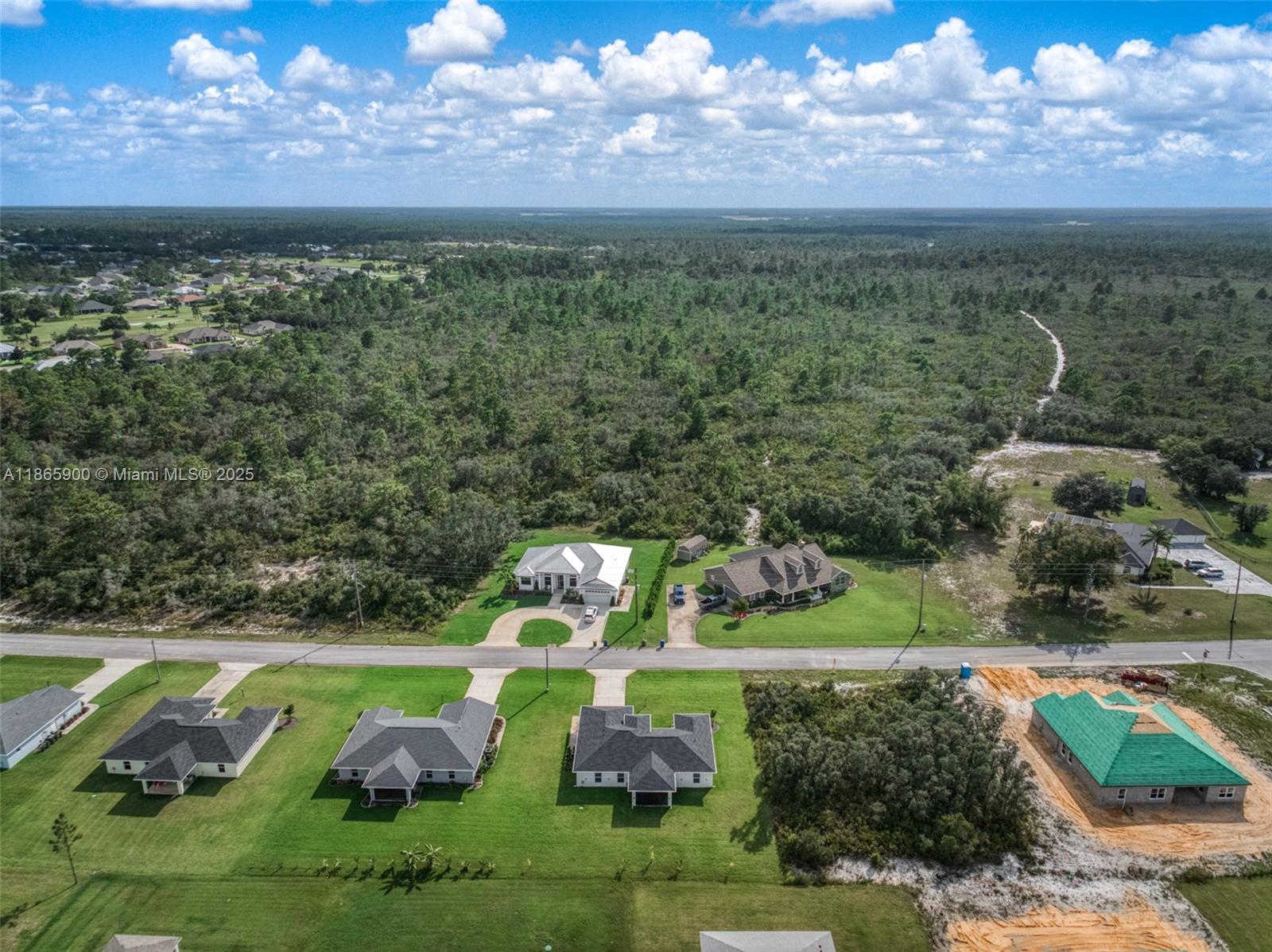5810 Columbus Boulevard Sebring, FL 33872 - Photo 43 of 49 a view of a golf course with a big yard