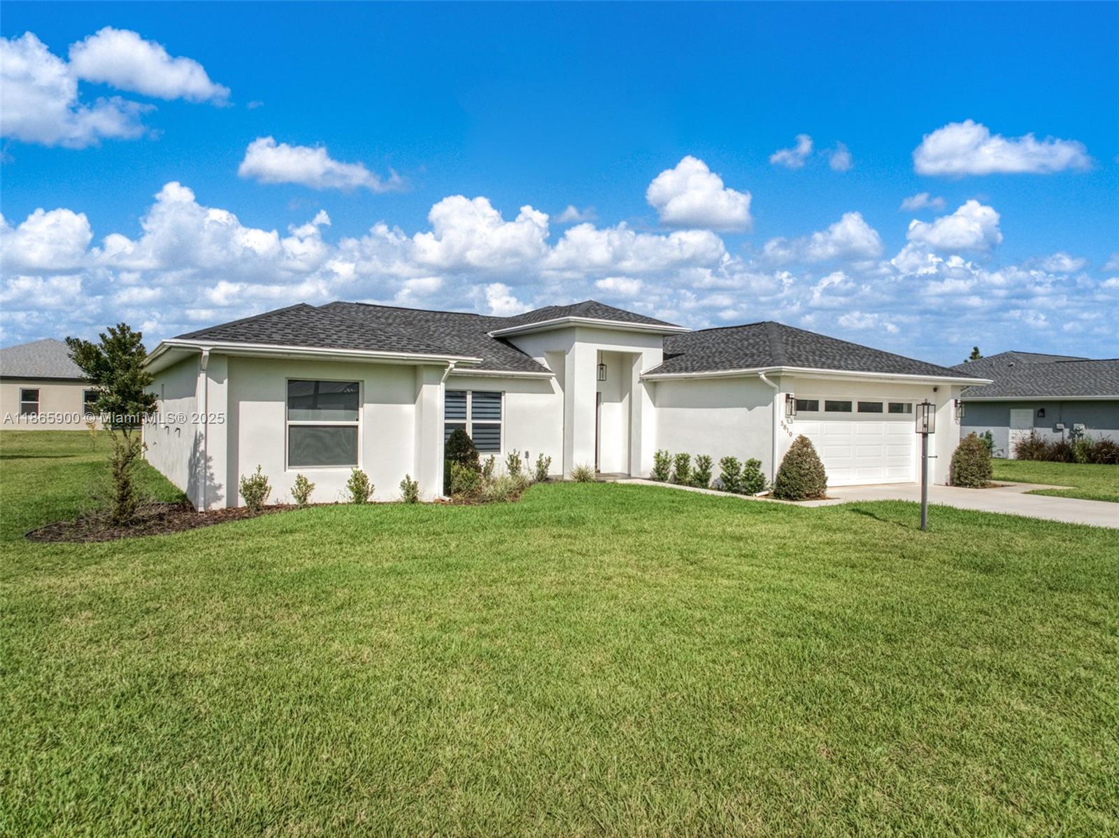 5810 Columbus Boulevard Sebring, FL 33872 - Photo 46 of 49 a view of a house with a back yard