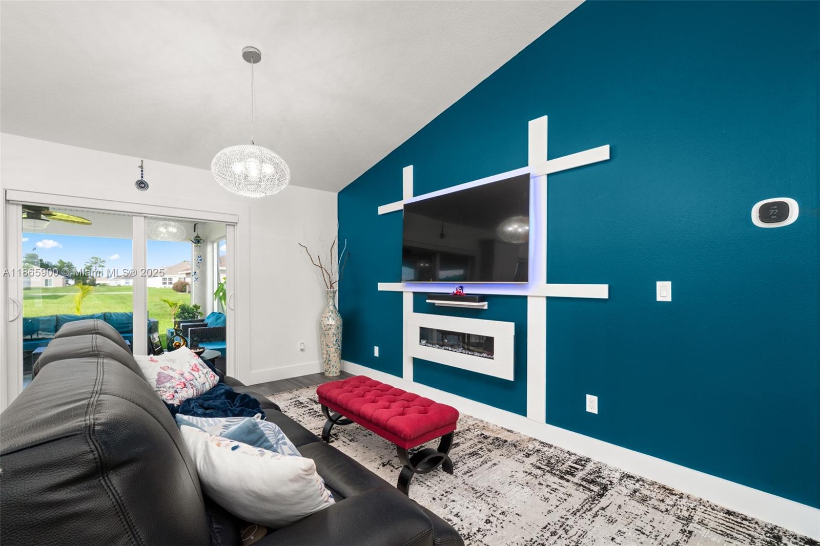 5810 Columbus Boulevard Sebring, FL 33872 - Photo 6 of 49 a living room with furniture and a flat screen tv