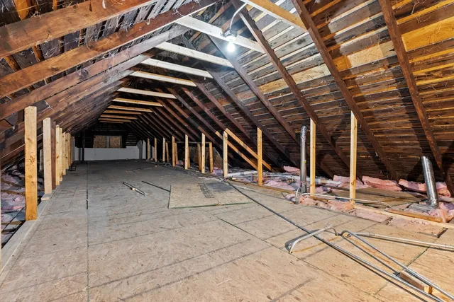 a view of swimming pool with seating space