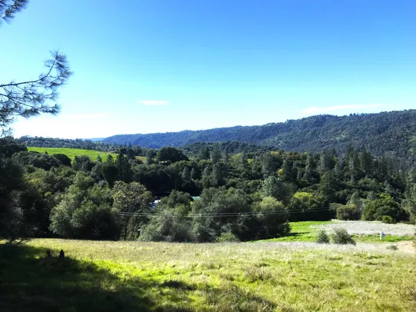 a view of an outdoor space with mountain view