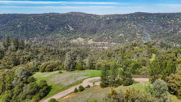 a view of a city and mountains
