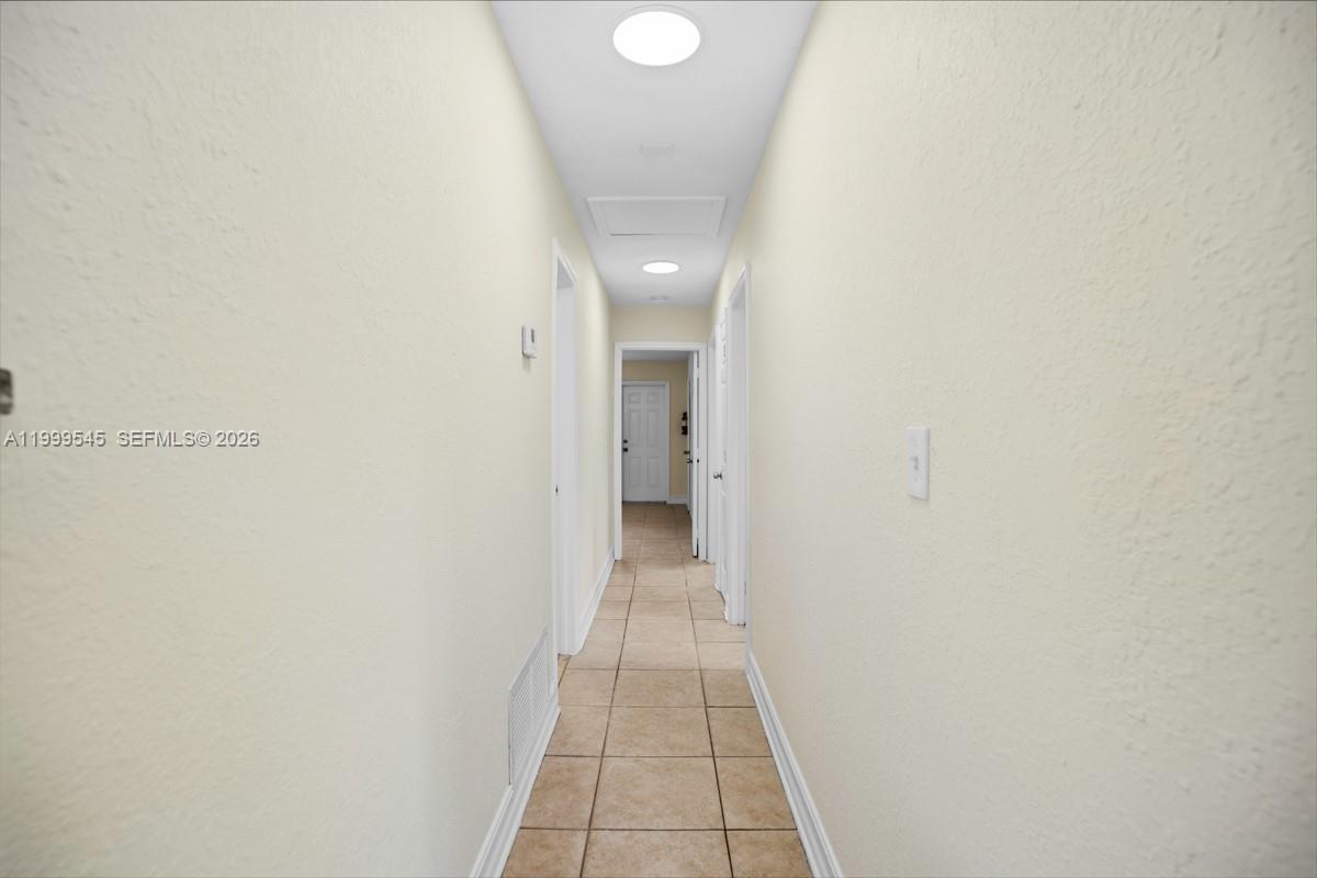 7604 Southwest 10th Court, Unit 2 Pompano Beach, FL 33068 - Photo 6 of 19 a view of a hallway